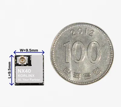 KORLINX NX40 Bluetooth module beside a 100 won coin